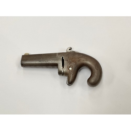 9300 - A Colt No. 1 Derringer in .41 rim fire cal, barrel flat marked Colts Pt. F.A. MFG. Co. Hartford CT. ... 