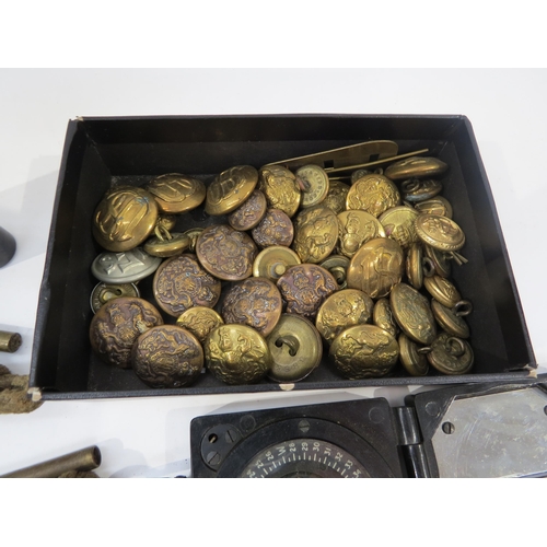 9160 - A box of various military badges and buttons together with a compass etc