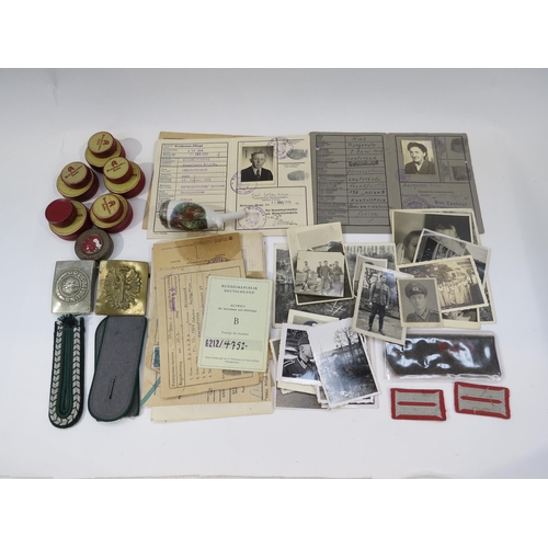 9168 - A box of WWII German related items including documents, photographs and badges