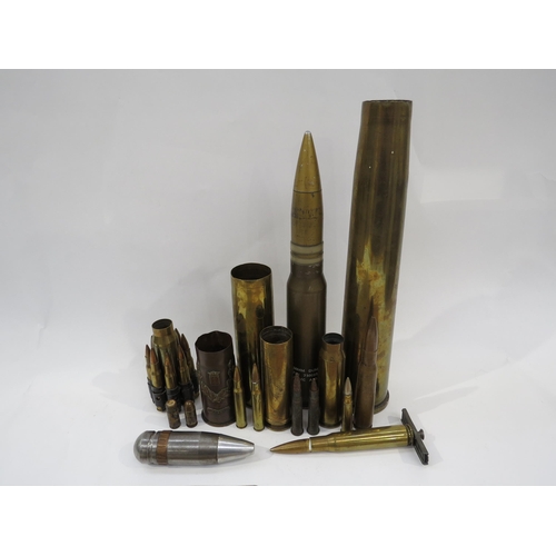 9172 - A quantity of military shell cases including 30mm dummy and Ypres trench art. Two booklets: Royal Ar... 