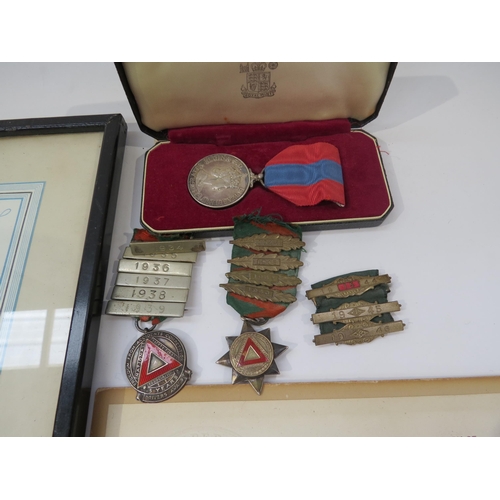 9235 - An Elizabeth II cased Imperial Service Medal (ISM) with award documents and driving proficiency meda... 