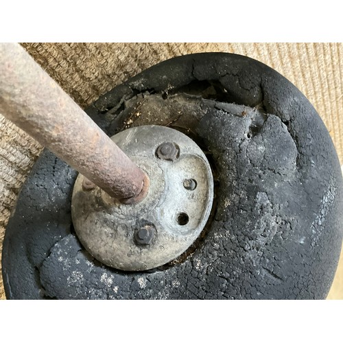 9014 - A WWII British fighter aircraft wheel on axle, relic condition, thought to be from a crashed Spitfir... 