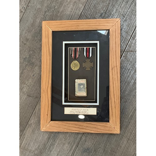 9032 - A pair of German with match box cover, framed and glazed