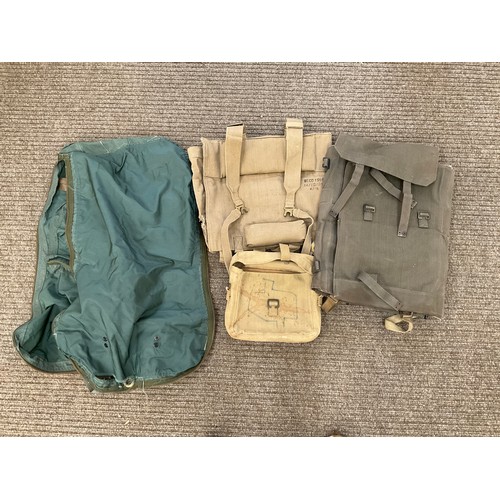 9043 - A quantity of webbing including Vickers machine gun carryall 1955 and WWII 1942 signals bag