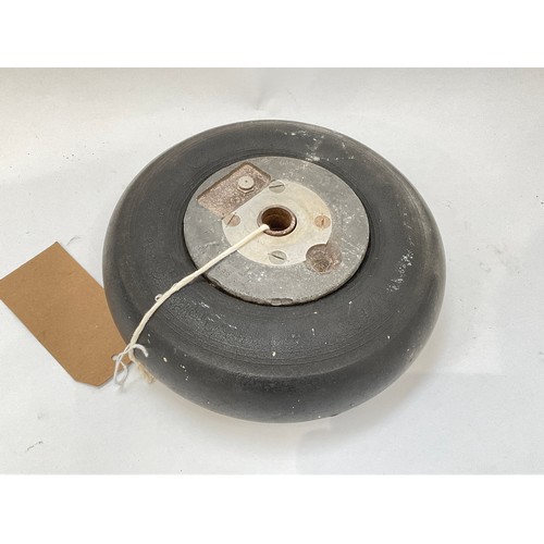 9047 - A WWII Spitfire rear wheel, serial number RF77197/1