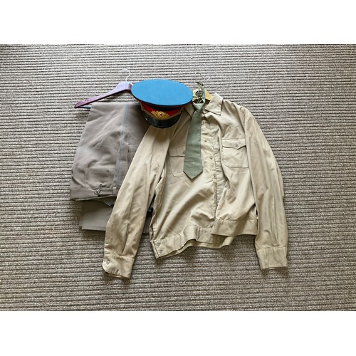 9053 - A Cold War era Russian Soviet USSR khaki shirt and tie, two pairs of trousers with blue stripe and a... 