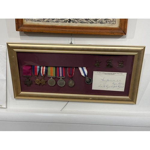 9072 - A framed and glazed display of medals in tribute (non original set) relating to Captain David Jamies... 