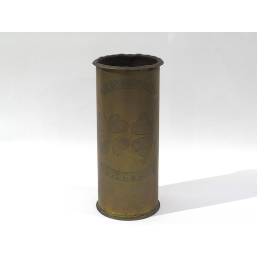 9185 - A WWI brass trench art shell case, engraved with 'SOUVENIR LA GUERRE' lettering and four-leaf clover... 