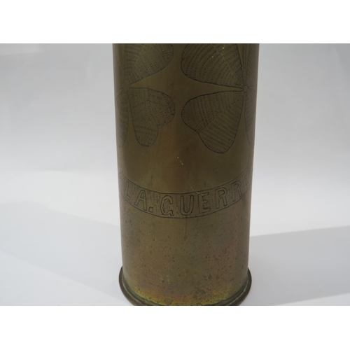 9185 - A WWI brass trench art shell case, engraved with 'SOUVENIR LA GUERRE' lettering and four-leaf clover... 