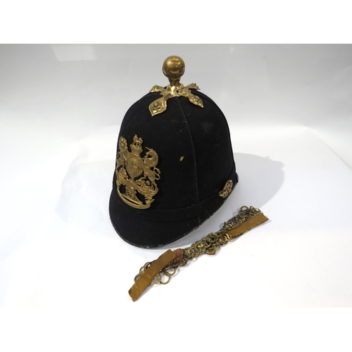 9187 - A Victorian Royal Artillery blue cloth helmet