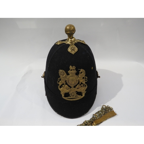 9187 - A Victorian Royal Artillery blue cloth helmet