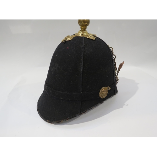 9187 - A Victorian Royal Artillery blue cloth helmet