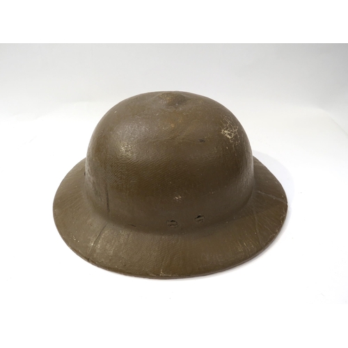 9198 - A WWII Japanese scarce home front light weight helmet