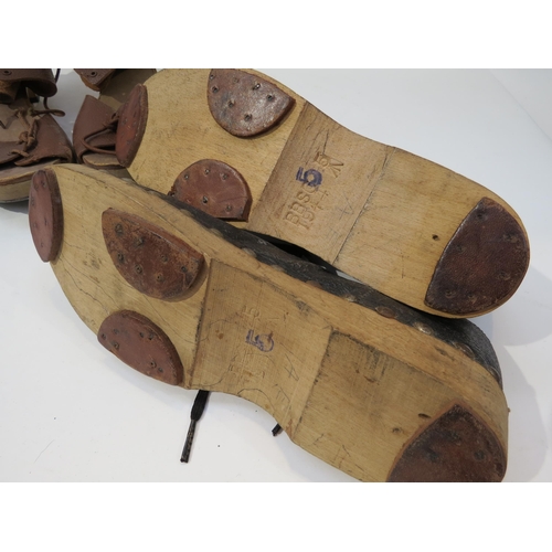 9202 - A pair of WWII Women's Land Army (W.L.A.) milking shoes, dated 1944, together with another pair