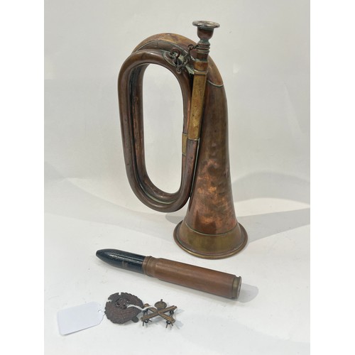 9395 - An early 20th Century brass and copper bugle by Thibouville-Lamy & Co., a 20mm 1942 M21 aircraft rou... 