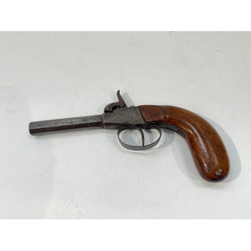 9310 - A 19th Century percussion pocket pistol, faceted barrel, walnut grip, no visible maker's name, 20cm ... 