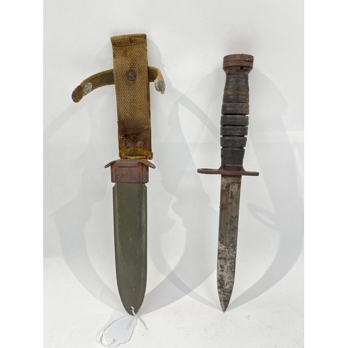 9311 - A US Army M3 trench knife housed within a US M8 scabbard by Beckwith Manufacturing Co., worn