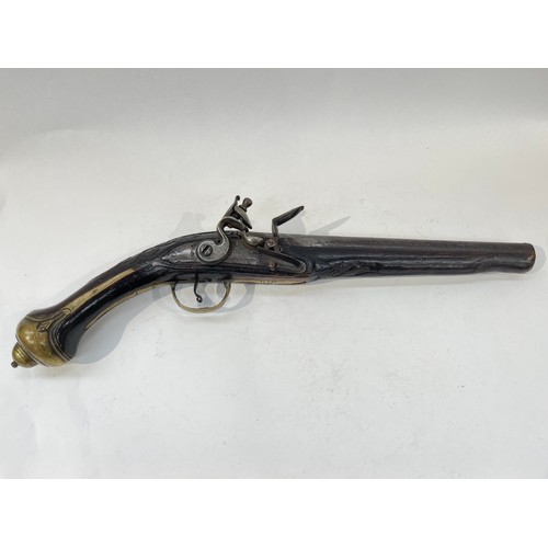 9306 - A continental flintlock pistol, the lock signed Banchi with carved stock, possibly Balkan      ANTIQ... 