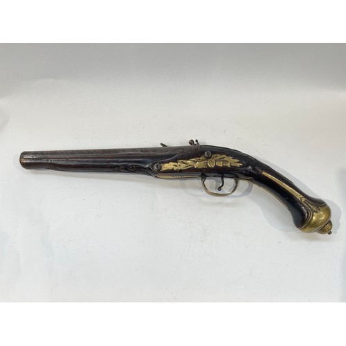 9306 - A continental flintlock pistol, the lock signed Banchi with carved stock, possibly Balkan      ANTIQ... 