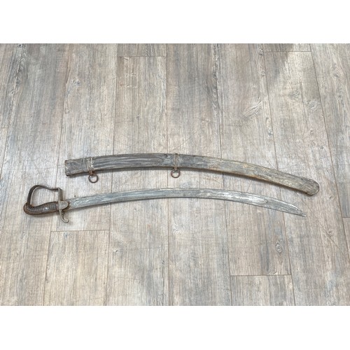 9288 - A late 18th / early 19th Century cavalry sabre, with scabbard, possibly Prussian