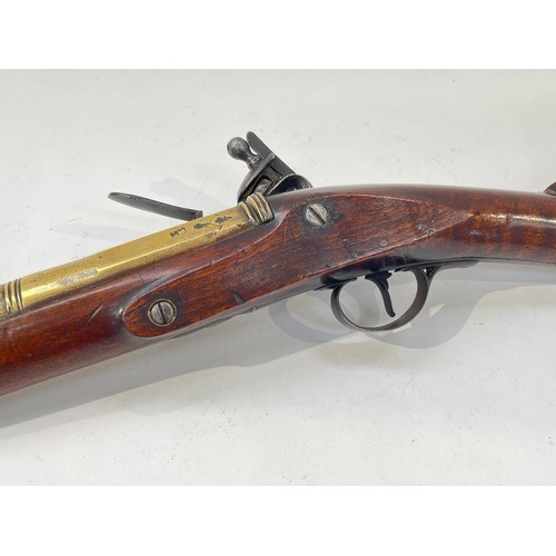 9291 - A 16-bore brass-barrelled flintlock blunderbuss signed Crawforth, Newcastle, circa 1765, with octago... 