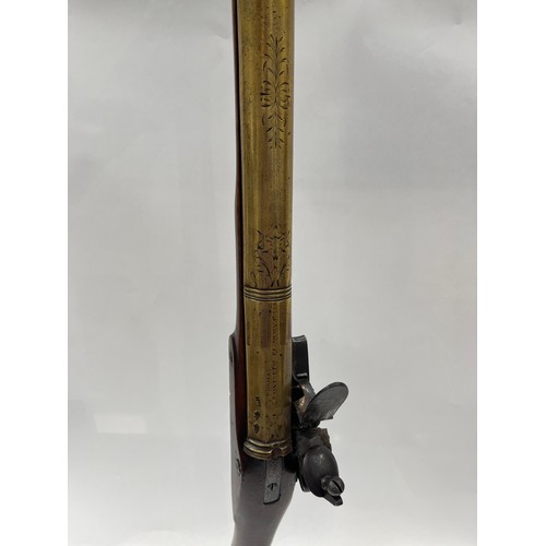 9291 - A 16-bore brass-barrelled flintlock blunderbuss signed Crawforth, Newcastle, circa 1765, with octago... 