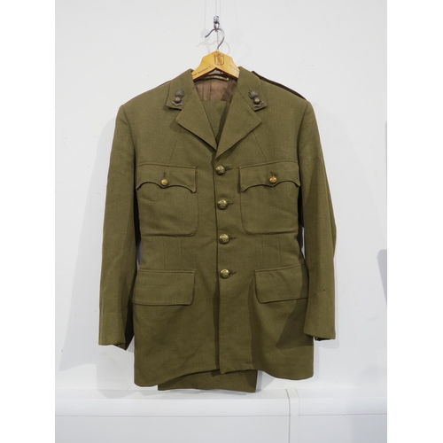 9091 - A WWII Royal Artillery officer's uniform with jacket, trousers, hat and Sam Browne, belonged to Capt... 