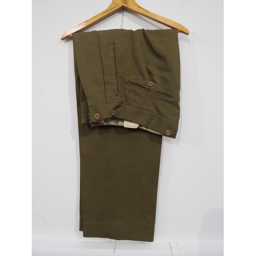 9091 - A WWII Royal Artillery officer's uniform with jacket, trousers, hat and Sam Browne, belonged to Capt... 