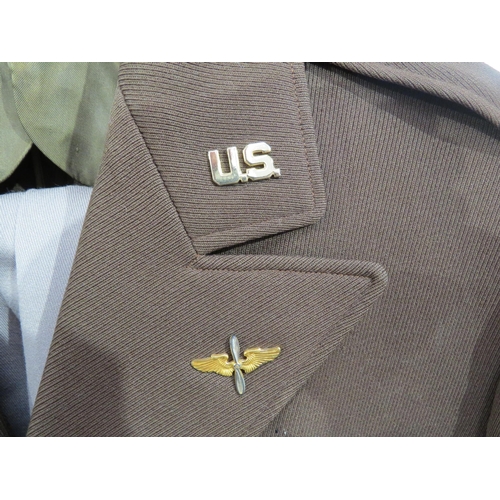 9092 - A WWII 8th Air Force officer's uniform with jacket, trousers and hat, with insignia