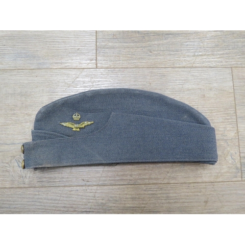 9096 - A WWII RAF uniform jacket, trousers and side hat with King's crown brass buttons and cap badge