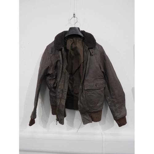 9097 - A WWII or later brown leather pilot's flying jacket