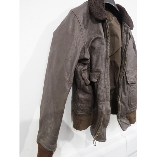 9097 - A WWII or later brown leather pilot's flying jacket