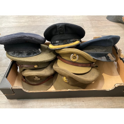 9110 - Two boxes of various British military headwear including pith helmet, RAF berets etc