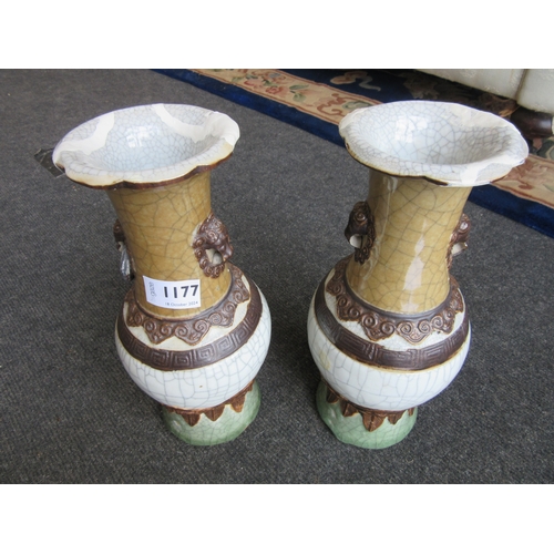 1177 - A pair of Chinese lion mask handled vases, A/F extensive repairs to rims and base, brown square char... 