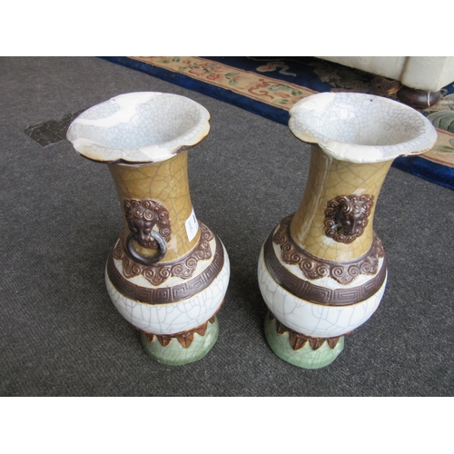 1177 - A pair of Chinese lion mask handled vases, A/F extensive repairs to rims and base, brown square char... 