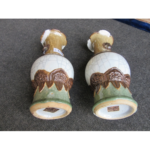 1177 - A pair of Chinese lion mask handled vases, A/F extensive repairs to rims and base, brown square char... 