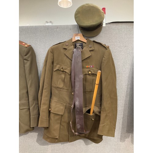 9117 - A WWII RASC officer's uniform consisting of jacket, trousers, hat and Sam Browne and swagger stick