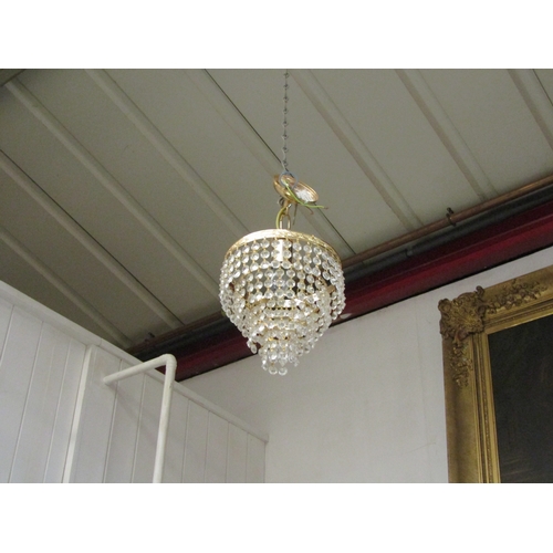 4467 - A pair of late 20th Century gilt framed stepped chandeliers. 20cm diameter, 35cm drop