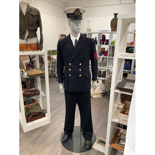 9142 - A mannequin dressed in a Royal Naval Reserve uniform