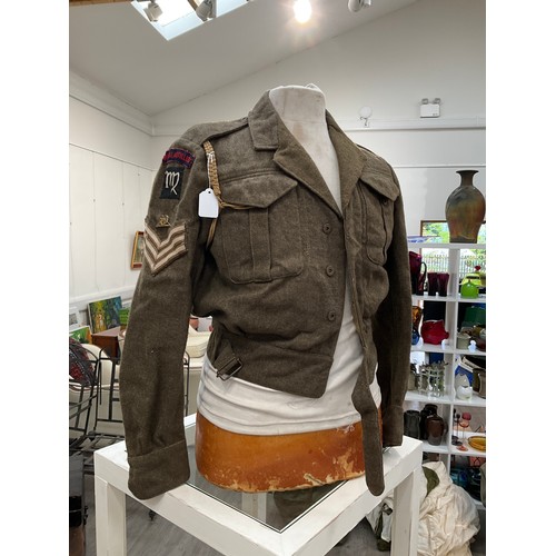 9144 - A WWII Canadian 1943 dated battledress blouse and trousers to a Sergeant in the Royal Artillery with... 