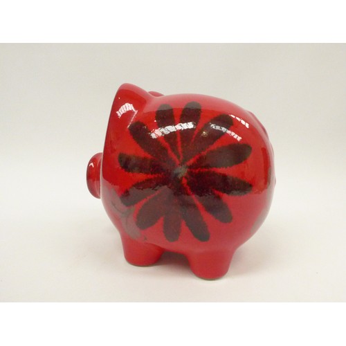 7018 - A Scheurich West German pottery large piggy bank with red glaze and floral design. 17.5cm high x 20c... 