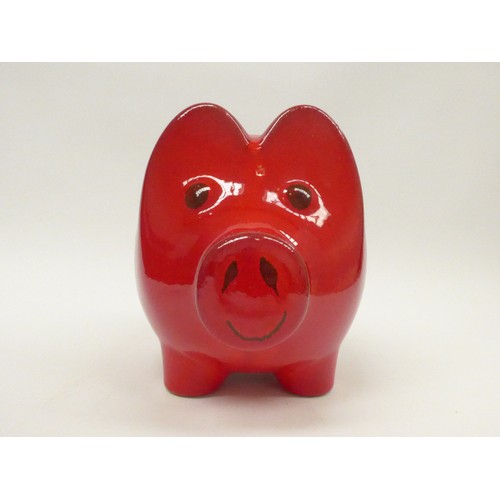 7018 - A Scheurich West German pottery large piggy bank with red glaze and floral design. 17.5cm high x 20c... 