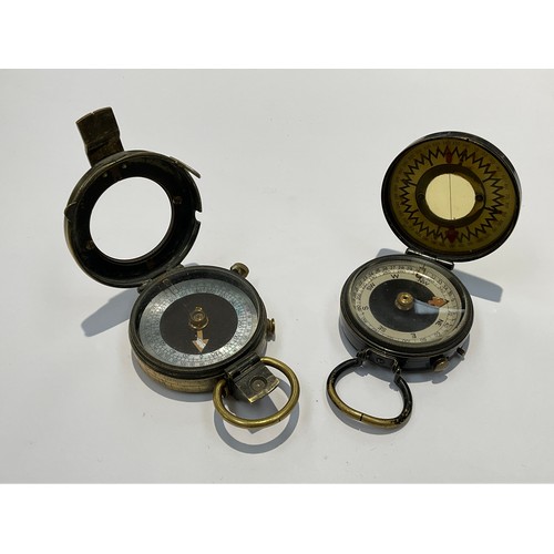 9512 - Two British military marching compasses, one dated 1917