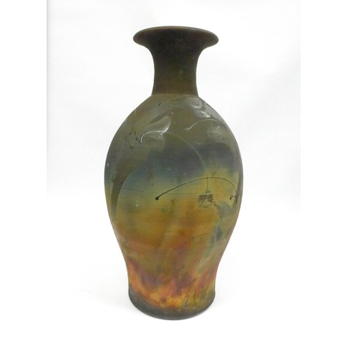 7112 - An Eeles Family Pottery large baluster form raku vase with burnished copper hues, applied gold and b... 