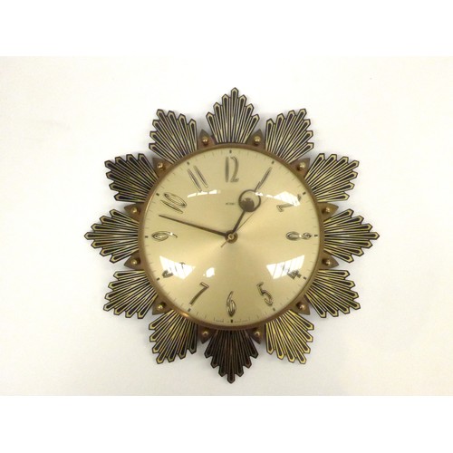 7364 - A Metamec sun burst wall clock. 33cm diameter