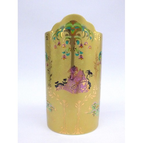 7177 - A Rosenthal porcelain Bjorn Wiinblad vase, gold coloured ground with figures in colours and highligh... 