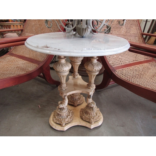 2004 - A 20th Century marble topped table on cast alloy base