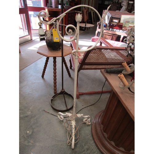 2010 - A wrought Iron standard lamp