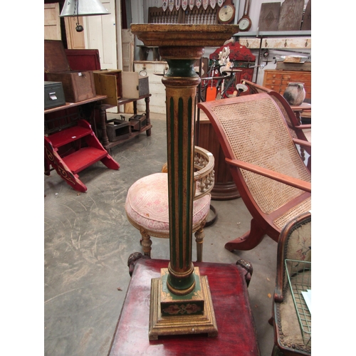 2014 - An Italian green and gilt painted column Jardinere stand