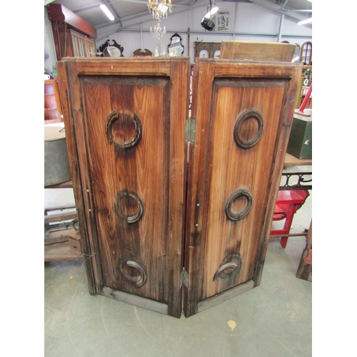 2030 - A pair of rustic pine two fold shutters